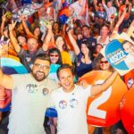 Felipe Vasques e Lukão durante atividade de campanha